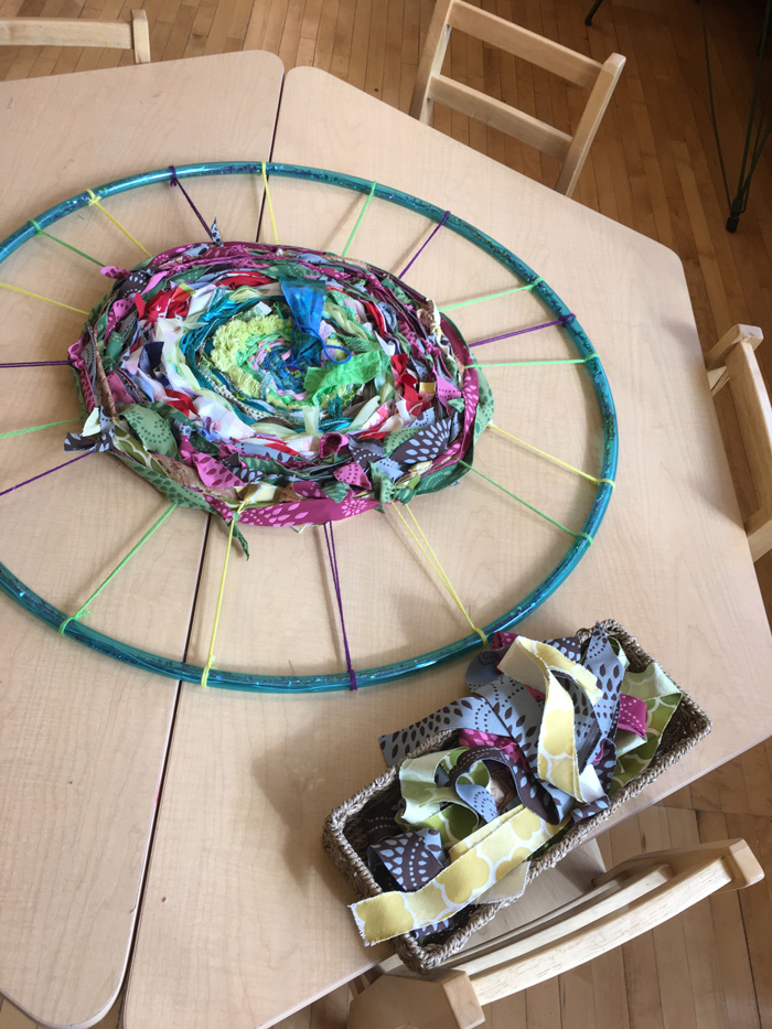 Weaving loom on table in Maker Studio.