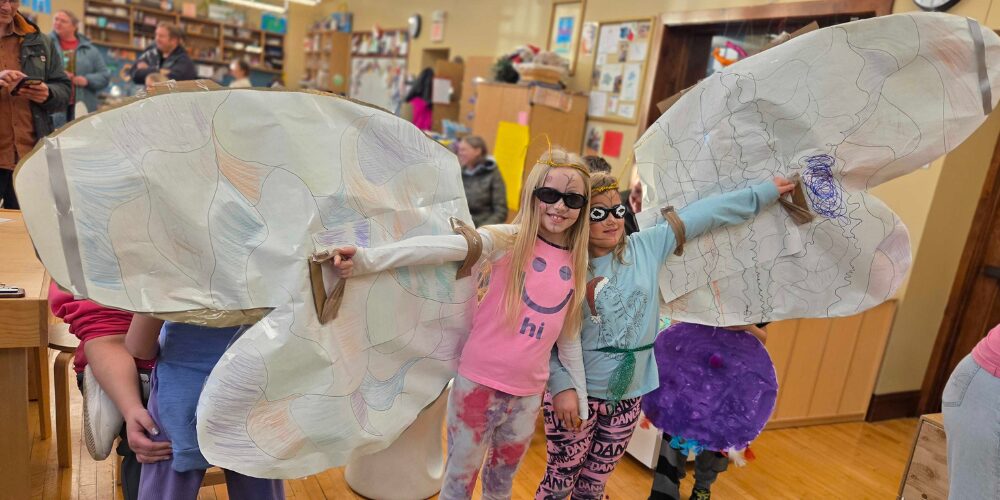 Campers dressed with wings for theater camp