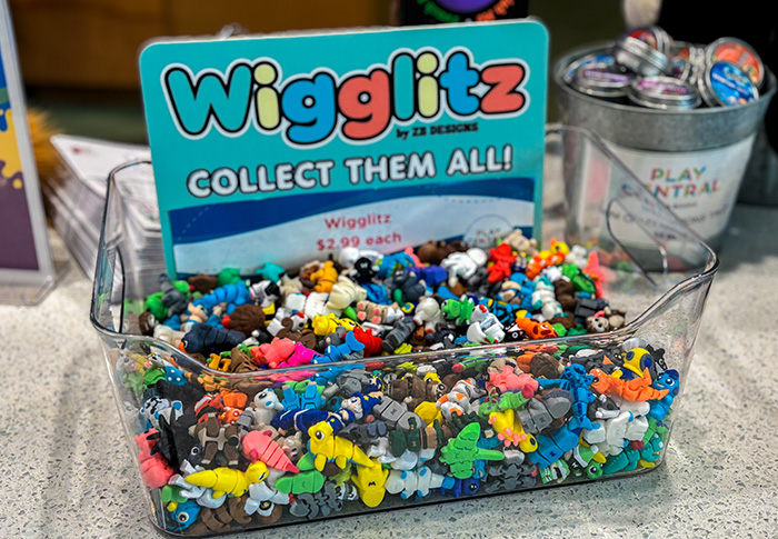 basket of 3D printed small toys